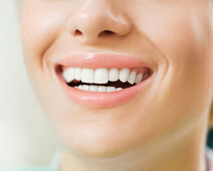 patient smiling with clear aligners in santa ana
